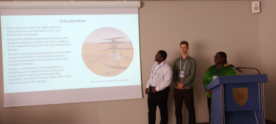 The students presenting their paper