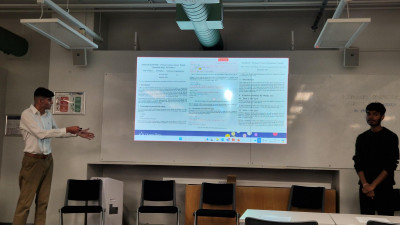 Muhie Al Haimus presenting his work
