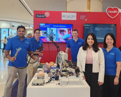 The team with their exhibition booth