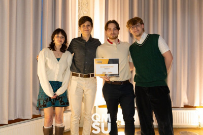 Members of the Cybathlon team accepting their awards